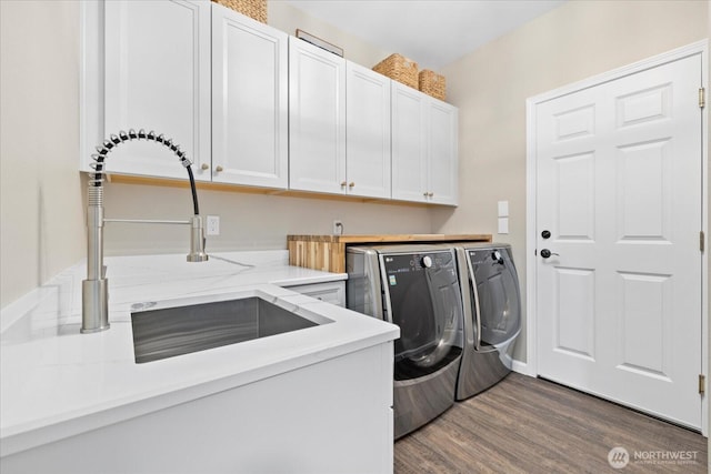 4212 145th Pl SE, Snohomish, WA 98296 - laundry area featuring washing machine and dryer, cabinet space, and dark wood-style flooring
