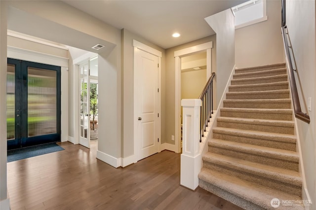 619 Graham Ave NE, Renton, WA 98059 - entrance foyer featuring dark wood-type flooring, stairway, recessed lighting, and french doors