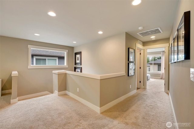 619 Graham Ave NE, Renton, WA 98059 - hallway with an upstairs landing, carpet, and recessed lighting