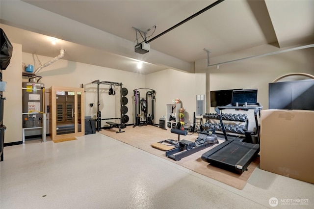 619 Graham Ave NE, Renton, WA 98059 - exercise room with water heater, a garage, and electric panel