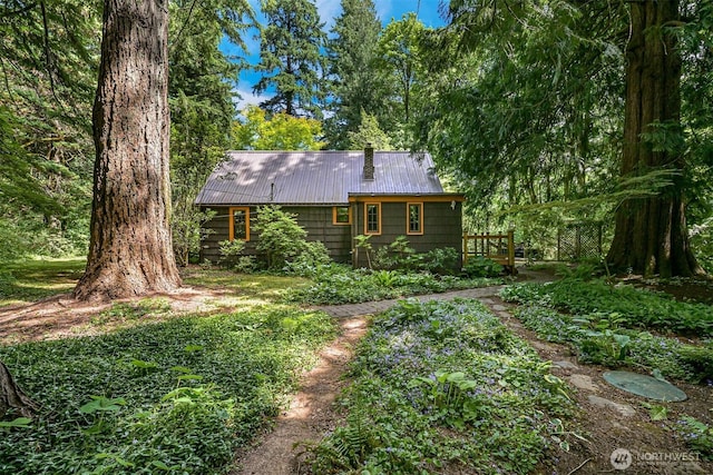 5510 Mt Baker Hwy, Deming, WA 98244 - rear view of house with a metal roof and a wooden deck