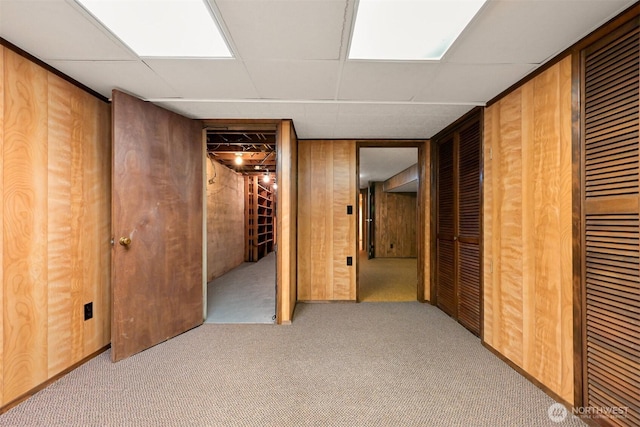5510 Mt Baker Hwy, Deming, WA 98244 - unfurnished bedroom with carpet floors, a paneled ceiling, and wooden walls