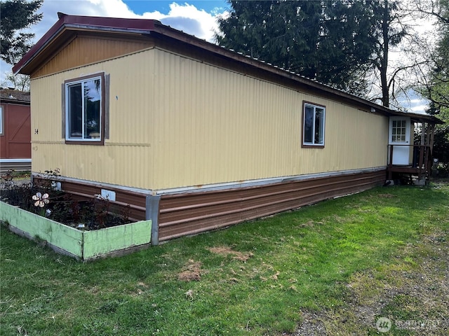 38 Hurd Rd Unit 34, Elma, WA 98541 - view of property exterior with a lawn