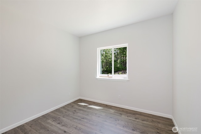 13540 Carney Lake Rd SW, Port Orchard, WA 98367 - unfurnished room with wood finished floors and baseboards