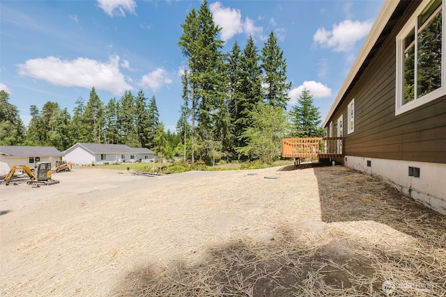 13540 Carney Lake Rd SW, Port Orchard, WA 98367 - view of yard with a wooden deck