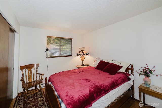 30026 5th Ave SW, Federal Way, WA 98023 - bedroom featuring a closet and wood finished floors