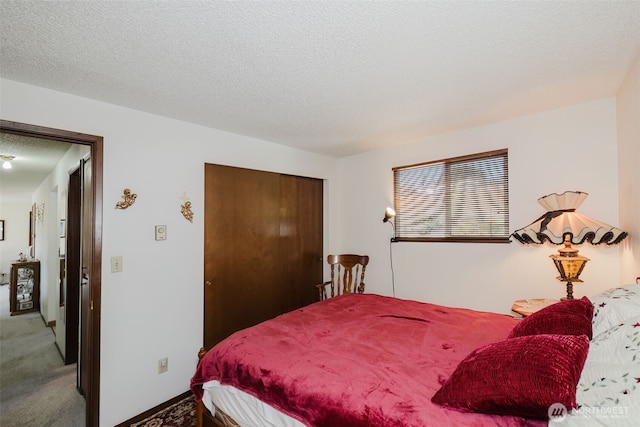 30026 5th Ave SW, Federal Way, WA 98023 - carpeted bedroom featuring a closet and a textured ceiling