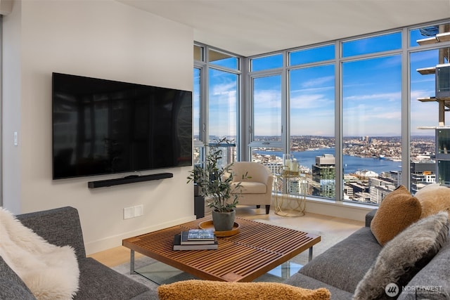 583 Battery St Unit 3802, Seattle, WA 98121 - living area with floor to ceiling windows and baseboards