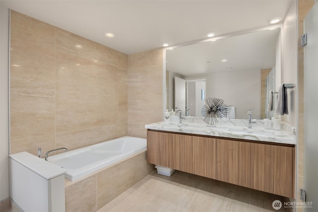 583 Battery St Unit 3802, Seattle, WA 98121 - bathroom with double vanity, a bath, tile patterned flooring, and recessed lighting
