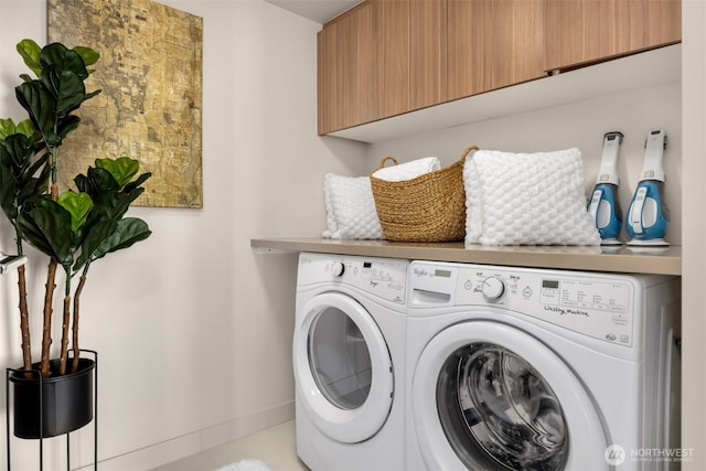 583 Battery St Unit 3802, Seattle, WA 98121 - laundry area featuring separate washer and dryer and cabinet space