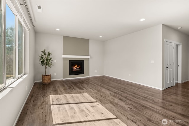 2846 Anna St NE, Lacey, WA 98516 - unfurnished living room featuring wood finished floors, a lit fireplace, and recessed lighting