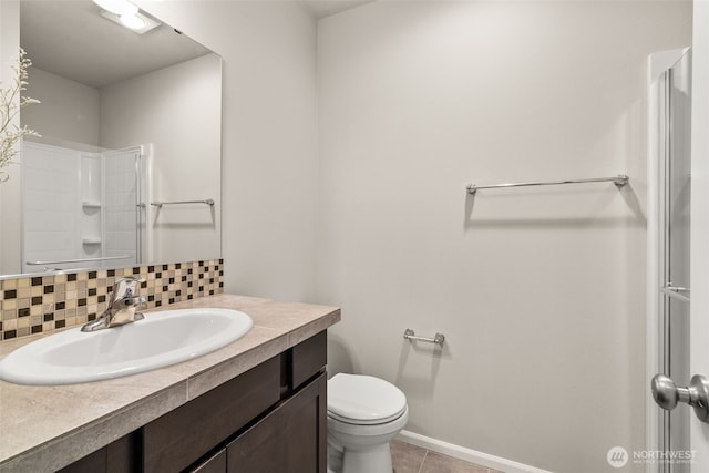 2846 Anna St NE, Lacey, WA 98516 - full bathroom with vanity, tasteful backsplash, tile patterned floors, and a shower