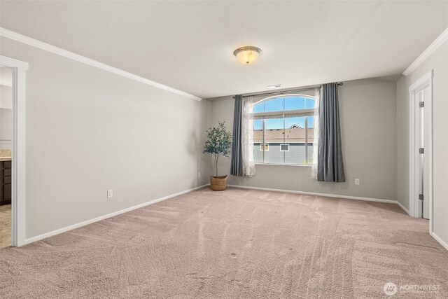 2846 Anna St NE, Lacey, WA 98516 - empty room featuring crown molding and carpet flooring