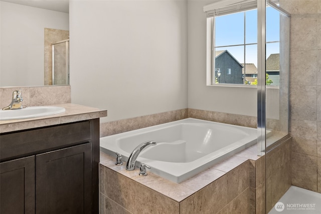 2846 Anna St NE, Lacey, WA 98516 - full bathroom with a garden tub, vanity, and a stall shower