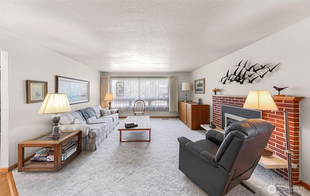 527 Fern Rd, Bellingham, WA 98225 - living area featuring a brick fireplace and a textured ceiling