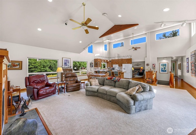 527 Fern Rd, Bellingham, WA 98225 - living room featuring a ceiling fan, high vaulted ceiling, recessed lighting, and light carpet