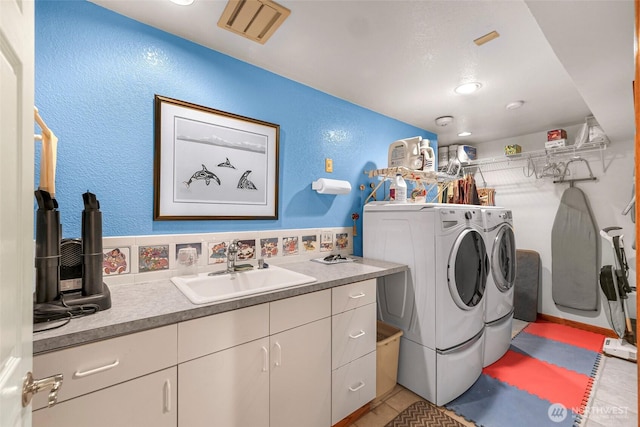527 Fern Rd, Bellingham, WA 98225 - laundry room featuring washing machine and clothes dryer and a textured wall