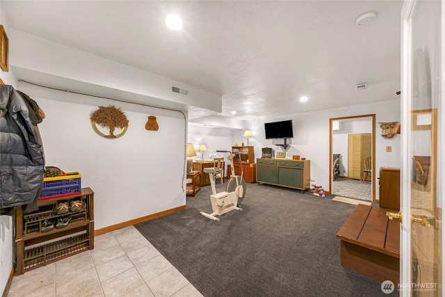 527 Fern Rd, Bellingham, WA 98225 - carpeted living room with recessed lighting and tile patterned flooring
