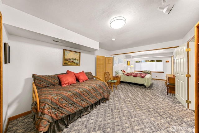 527 Fern Rd, Bellingham, WA 98225 - carpeted bedroom with baseboards and a textured ceiling