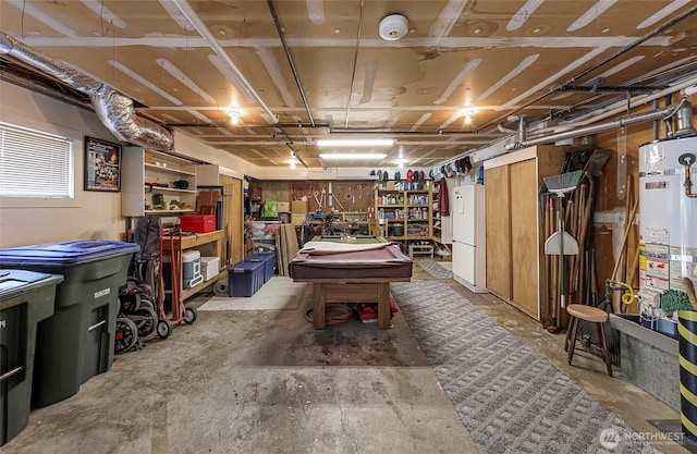 527 Fern Rd, Bellingham, WA 98225 - garage with strapped water heater and freestanding refrigerator