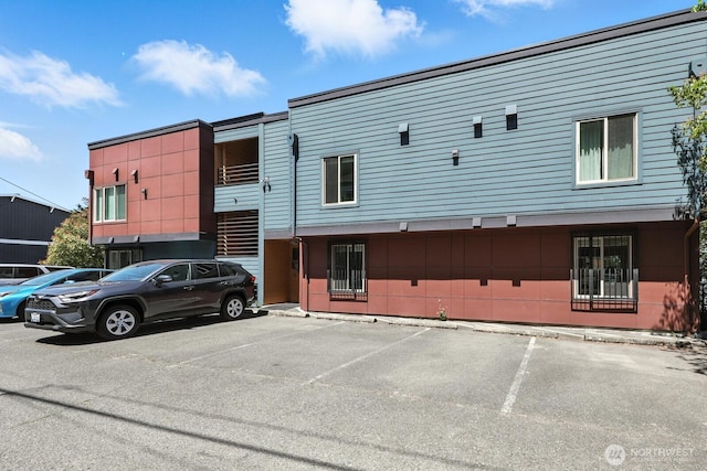 29 Etruria St Unit B405, Seattle, WA 98109 - view of building exterior featuring uncovered parking