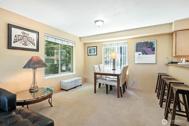 29 Etruria St Unit B405, Seattle, WA 98109 - dining area featuring light colored carpet