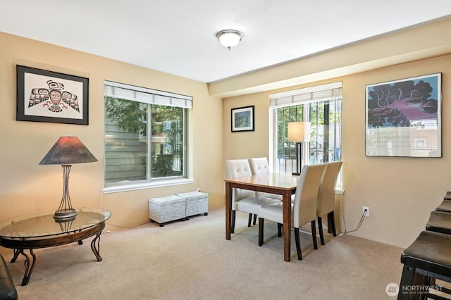 29 Etruria St Unit B405, Seattle, WA 98109 - dining room with carpet flooring and plenty of natural light
