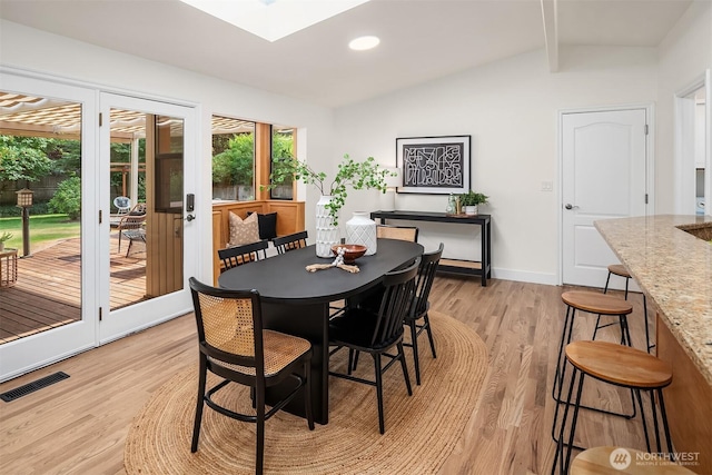 16223 NE 26th St, Bellevue, WA 98008 - dining area with light wood-type flooring, a skylight, and recessed lighting