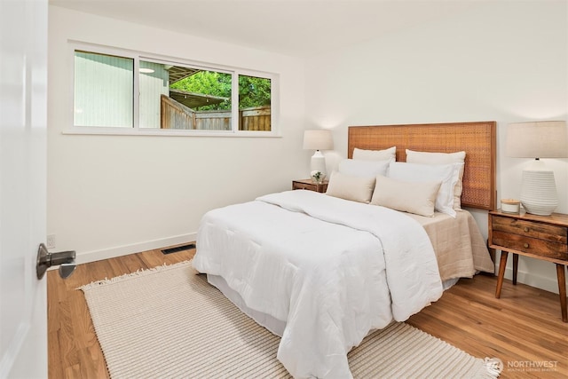16223 NE 26th St, Bellevue, WA 98008 - bedroom with wood finished floors and baseboards