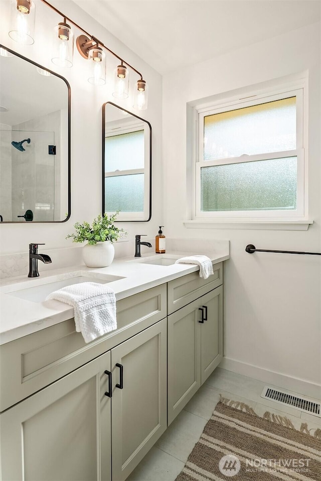 16223 NE 26th St, Bellevue, WA 98008 - bathroom featuring double vanity, plenty of natural light, and a shower stall