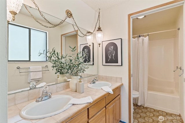 17726 NE 26th St, Redmond, WA 98052 - bathroom with double vanity, shower / bath combo, and a textured ceiling