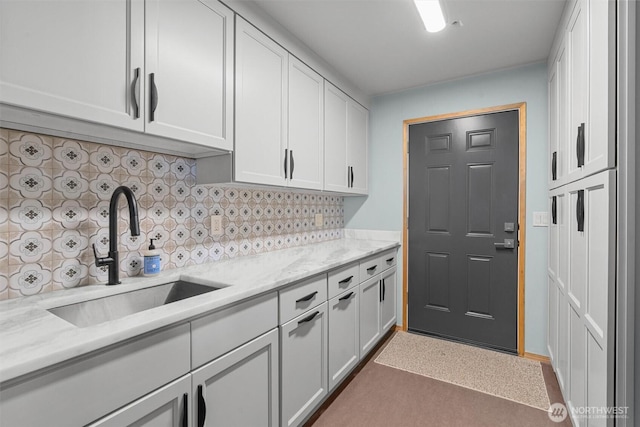 10212 SW 127th St, Vashon, WA 98070 - kitchen featuring tasteful backsplash, white cabinetry, and light stone counters