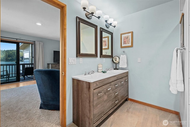 10212 SW 127th St, Vashon, WA 98070 - full bathroom featuring double vanity and baseboards