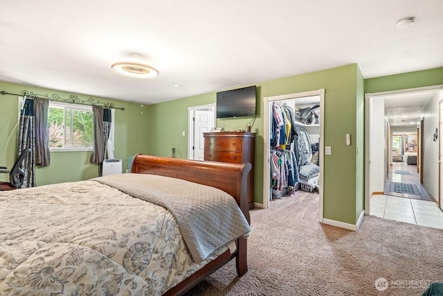 1315 Thomas St, Aberdeen, WA 98520 - bedroom featuring light colored carpet, a walk in closet, and a closet