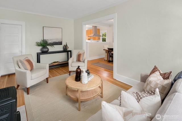 5041 Baker Ave NW, Seattle, WA 98107 - living area with wood finished floors and crown molding
