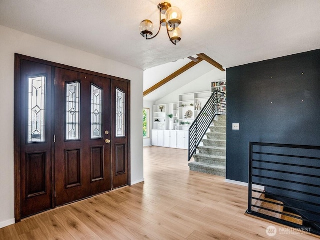 2 W Johnson Ln, Lind, WA 99341 - foyer with a chandelier, stairs, and light wood-type flooring