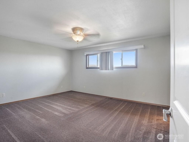 2 W Johnson Ln, Lind, WA 99341 - carpeted empty room featuring a ceiling fan and baseboards