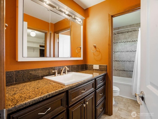 2 W Johnson Ln, Lind, WA 99341 - bathroom featuring vanity and shower / bath combo with shower curtain