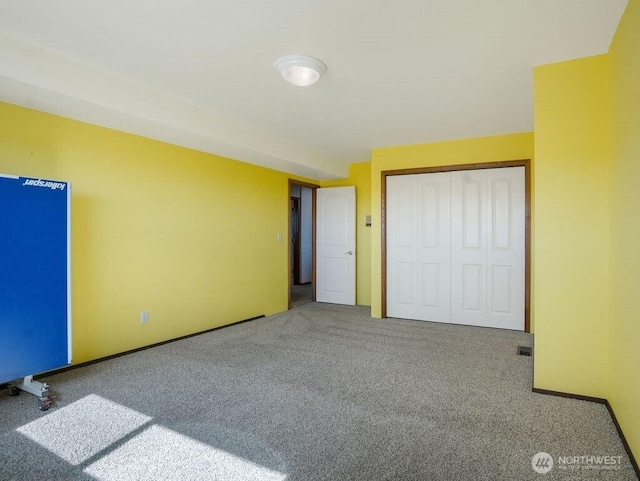 2 W Johnson Ln, Lind, WA 99341 - unfurnished bedroom featuring carpet and a closet