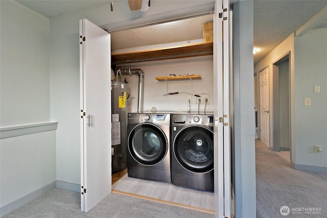 5701 38th Ct SE, Lacey, WA 98503 - washroom featuring independent washer and dryer, a textured ceiling, carpet flooring, and water heater