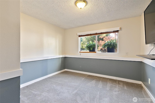 5701 38th Ct SE, Lacey, WA 98503 - carpeted empty room featuring a textured ceiling and baseboards