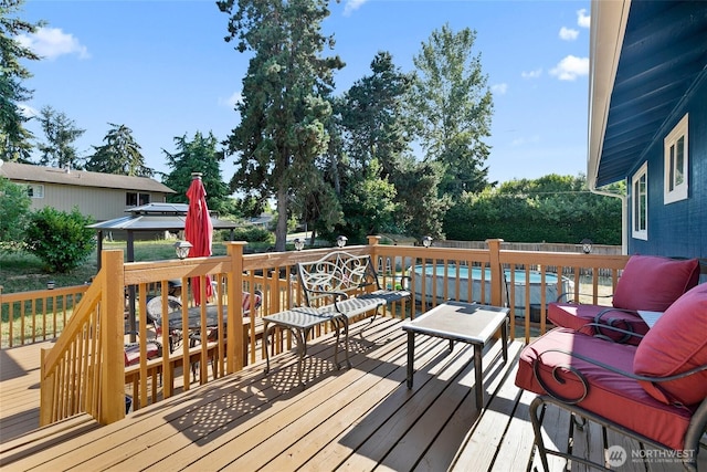 5701 38th Ct SE, Lacey, WA 98503 - wooden deck with an outdoor living space