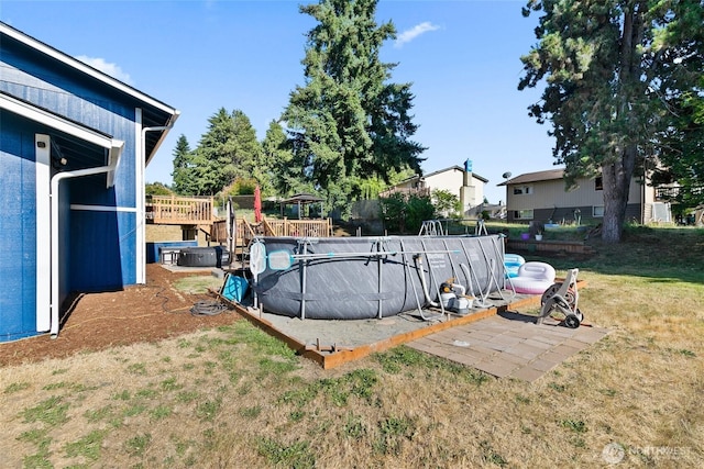 5701 38th Ct SE, Lacey, WA 98503 - view of swimming pool with a yard and a deck