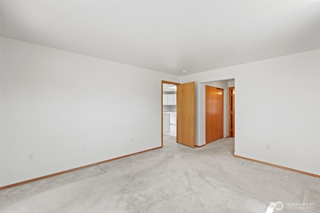 19214 Lakeview Dr, Soap Lake, WA 98851 - unfurnished room featuring light colored carpet and baseboards