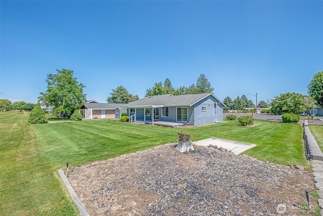 19214 Lakeview Dr, Soap Lake, WA 98851 - rear view of property featuring a yard