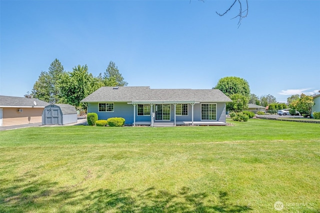 19214 Lakeview Dr, Soap Lake, WA 98851 - ranch-style house with a shed, covered porch, and a front yard
