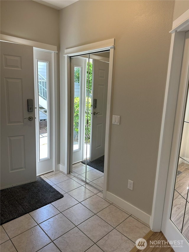 515 W Kellogg Rd, Bellingham, WA 98226 - foyer featuring healthy amount of natural light and light tile patterned floors