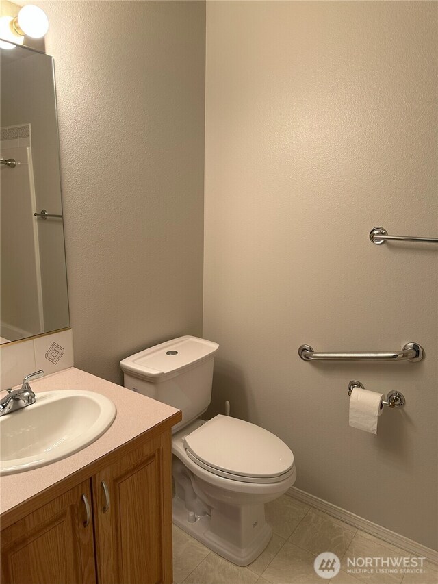 515 W Kellogg Rd, Bellingham, WA 98226 - bathroom with tile patterned flooring and vanity
