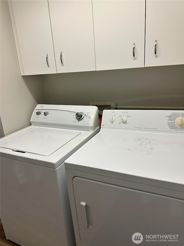 515 W Kellogg Rd, Bellingham, WA 98226 - washroom featuring separate washer and dryer and cabinet space