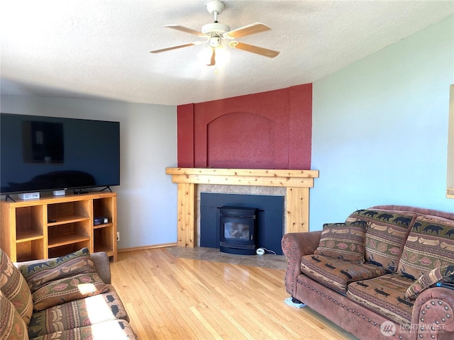 4820 NE 7.5 Rd, Moses Lake, WA 98837 - living area with wood finished floors, ceiling fan, and a textured ceiling